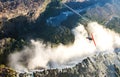 Tourists fly over the Victoria Falls on the trikes. Royalty Free Stock Photo